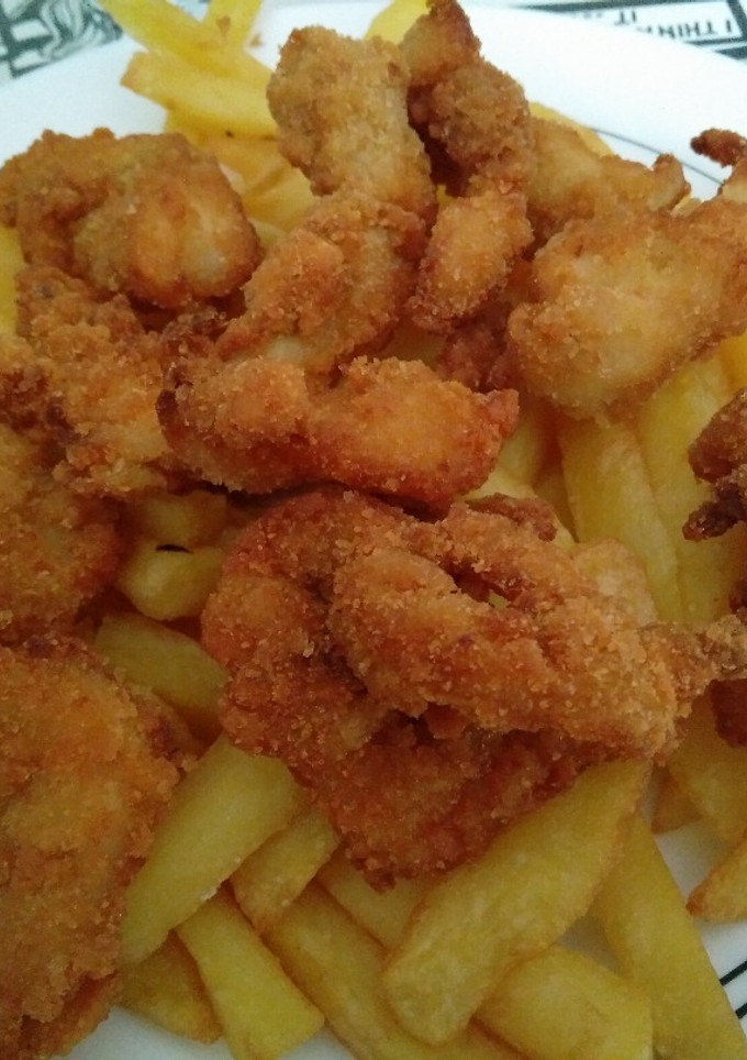 Una foto de Lágrimas de pollo con patatas para torpes