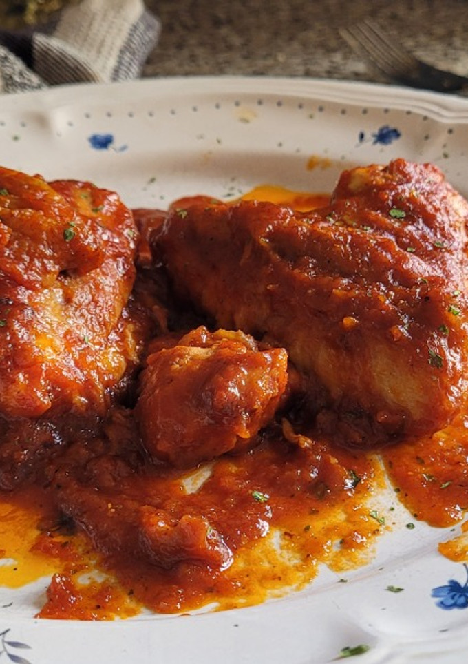 Una foto de Pollo con Tomate