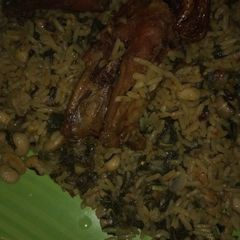A picture of Jollof rice and beans.