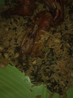 A picture of Jollof rice and beans.