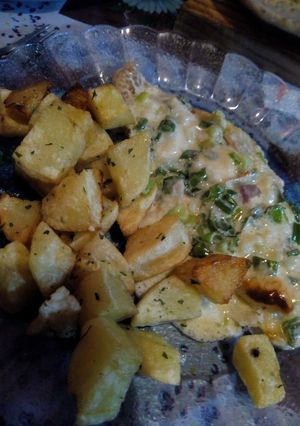 Una foto de Filet de merluza con crema y verdeo