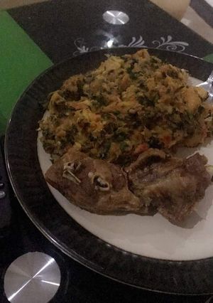 A picture of Porridge Yam with Fried Turkey.
