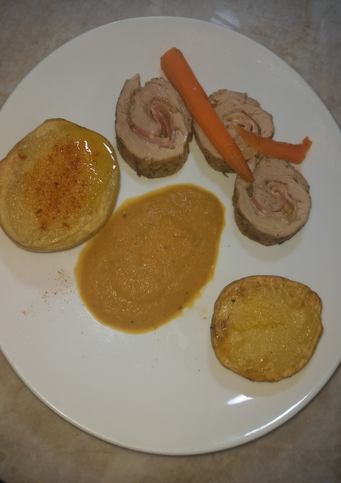 Una foto de Solomillo de cerdo relleno al horno