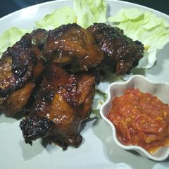 A picture of Ayam Bakar Kecap (Grilled Chicken with Sweet Soy Sauce).