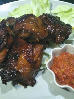 A picture of Ayam Bakar Kecap (Grilled Chicken with Sweet Soy Sauce).