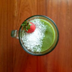 A picture of Payapaya, strawberry, green smoothie.