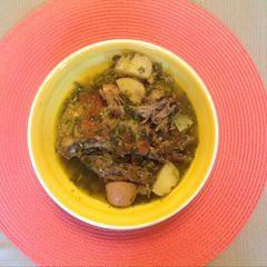 A picture of Pork Ribs with Verdolagas (Purslane).