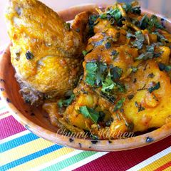 A picture of Yam porridge and chicken wings.