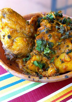 A picture of Yam porridge and chicken wings.