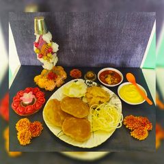 A picture of Gudi padwa special Puri bhaji.