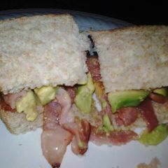 A picture of Bacon, avo & cheese sandwich.