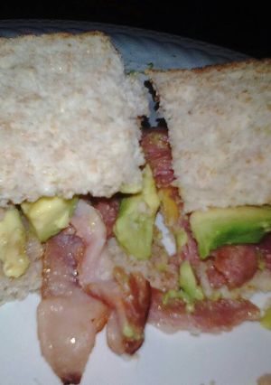 A picture of Bacon, avo & cheese sandwich.