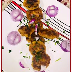 A picture of Mutton Raw mins smoked kebabs.