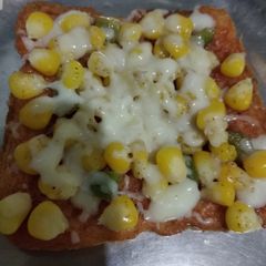 A picture of Corn Cheese Bread Pizza.