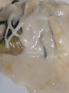 Una foto de Canelones de calabacín rellenos