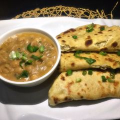 A picture of Flat bread with chickpeas porridge.