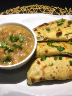 A picture of Flat bread with chickpeas porridge.