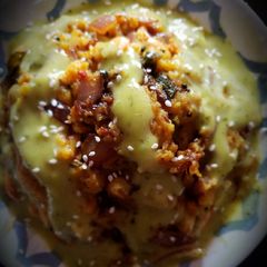 A picture of Guacamole raisin peanuts POHA.