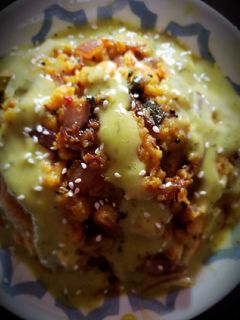 A picture of Guacamole raisin peanuts POHA.