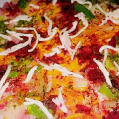 A picture of Mix_salad_cheesy_Uttapm.