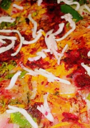 A picture of Mix_salad_cheesy_Uttapm.