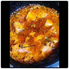 A picture of Tomato chicken achari.