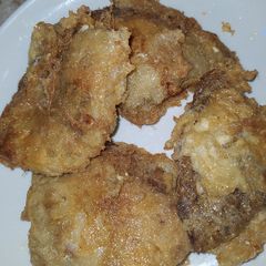 A picture of Fried gurasa with egg.