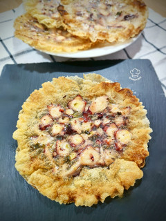 Una foto de Crujiente de pulpo al ajillo