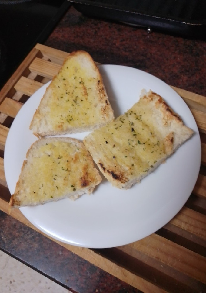 Una foto de Pan de ajo a la plancha