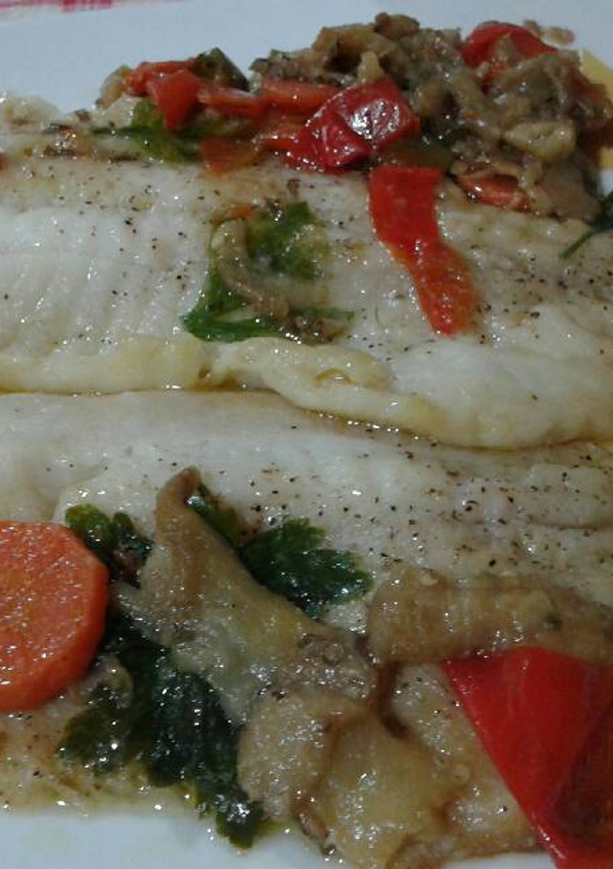 Una foto de Tilapia, merluza, fletán... en papillote