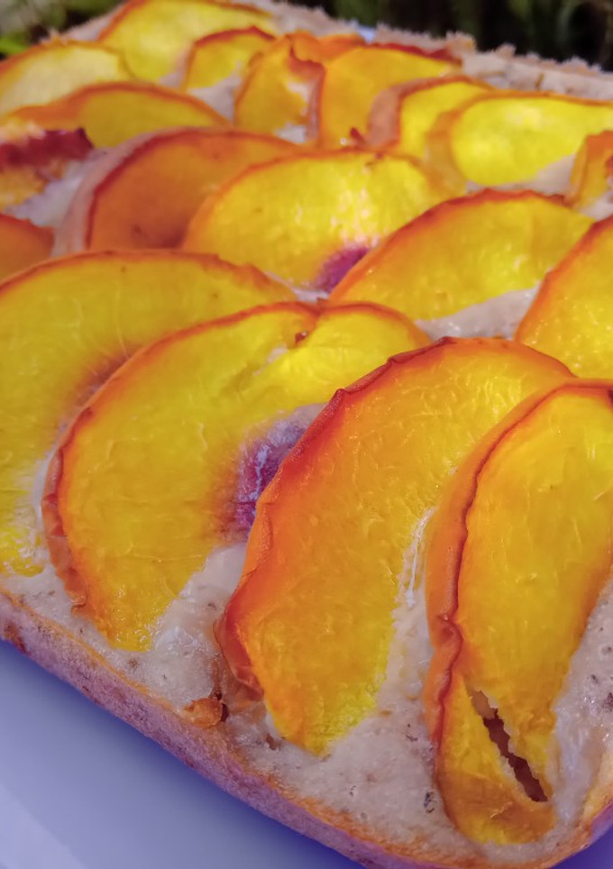 Una foto de Torta de ricota y durazno sin tacc 🍑
