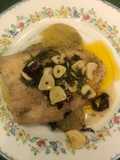 Filete de pescado sobre papas