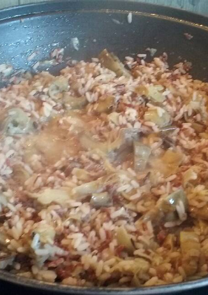 Una foto de Arroz salvaje con alcachofas