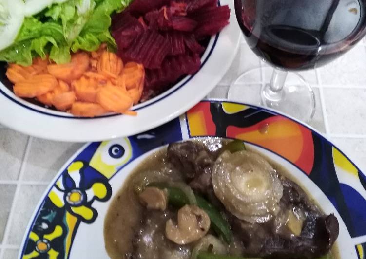 Corazón de res con champiñones al vino