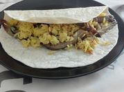 Una foto de como hacer quesadilla de arroz