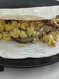Una foto de Quesadilla de setas y arroz al curry