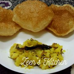 A picture of Puri and Aloo Masala.