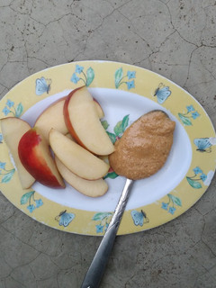 A picture of Apple Slices and Peanut Butter.