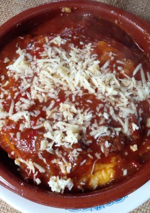 Una foto de Polenta con tuco