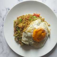 A picture of Nasi goreng KW (kembang kol goreng).