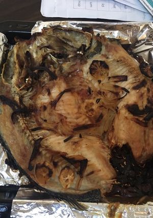صورة لوصفة سمك مشوي مع رز شراب الرمان