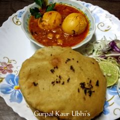 A picture of Creamy Chickpea Egg Curry in Yogurt Gravy.