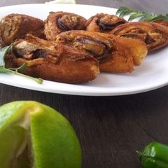 A picture of Arikadukka - Stuffed Mussels... A Malabar Special Snack...
