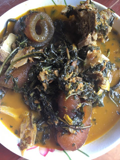 A picture of Bitter leaf soup with assorted meat.
