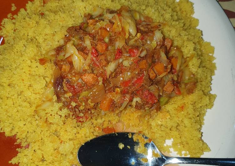 Fried cous cous with vegetable and shredded beef stew