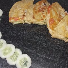 A picture of Sandwich pizza from leftover Roti.