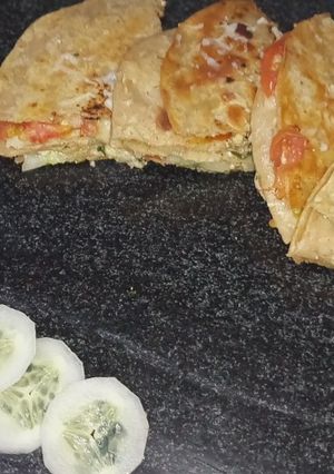 A picture of Sandwich pizza from leftover Roti.