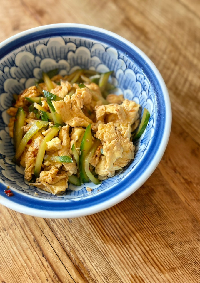 A picture of Cucumber, eggs, toban djan (Chilli bean paste).