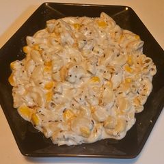 A picture of White sauce cheese macaroni pasta.