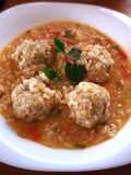 Arroz caldoso al azafrán con pelotillas de carne de cerdo